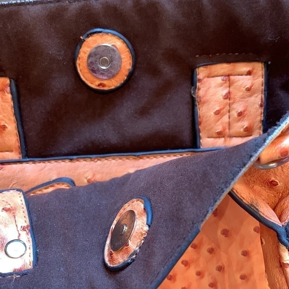 Studio 36 medium to large purse/tote bag. Really nice quality. Orange/4 zip outs